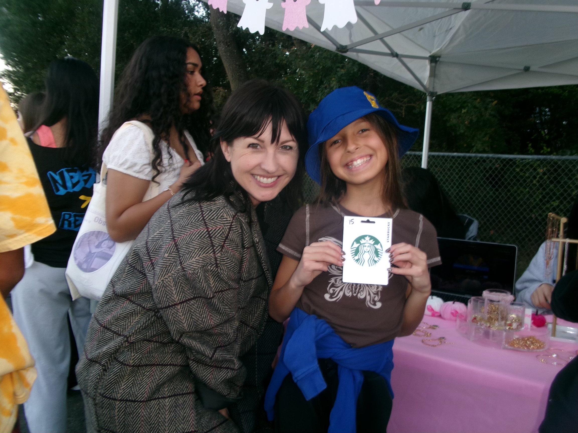 Rare Gems booth photo with event guest