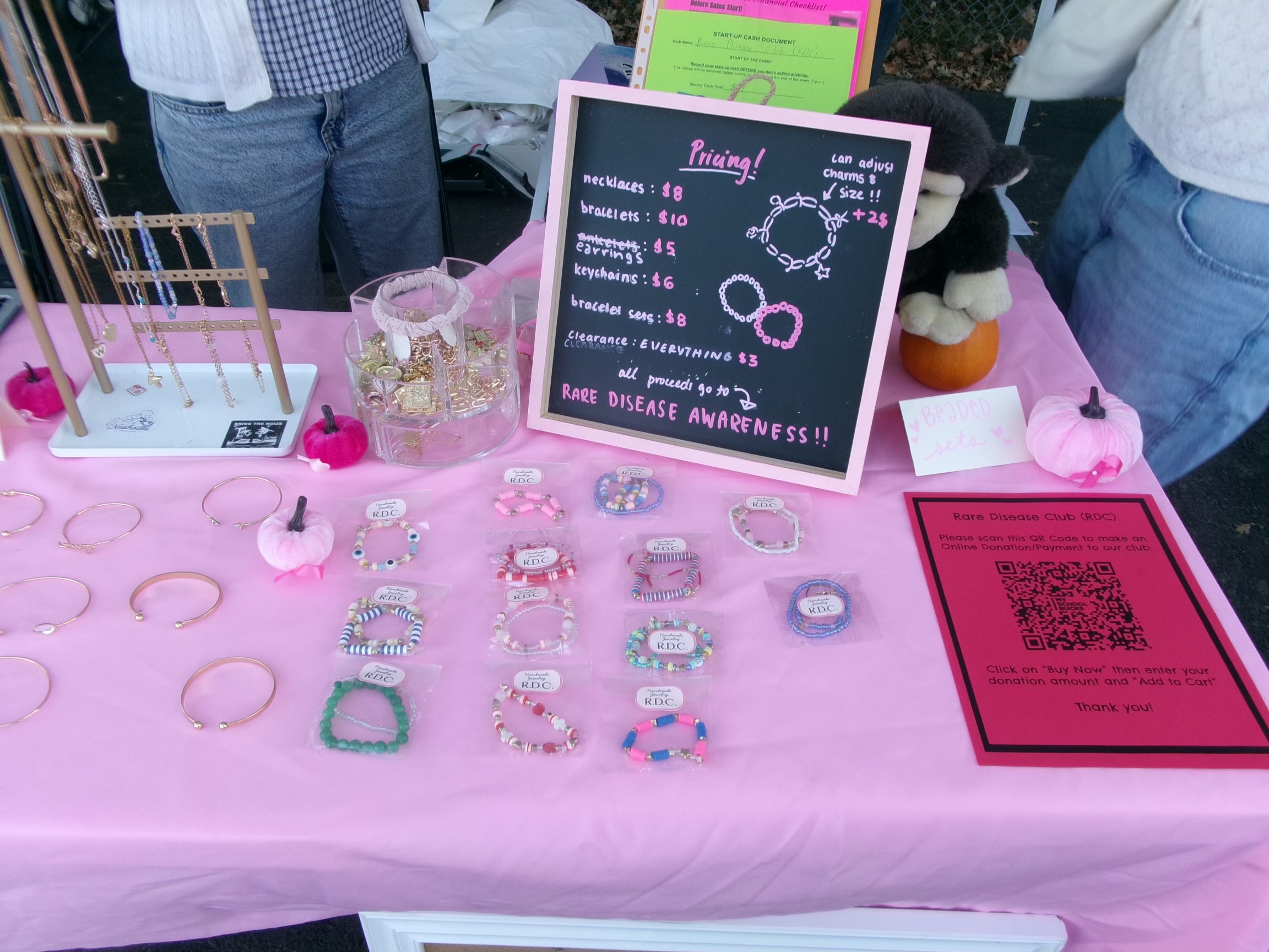 Rare Gems pricing board and bracelet display