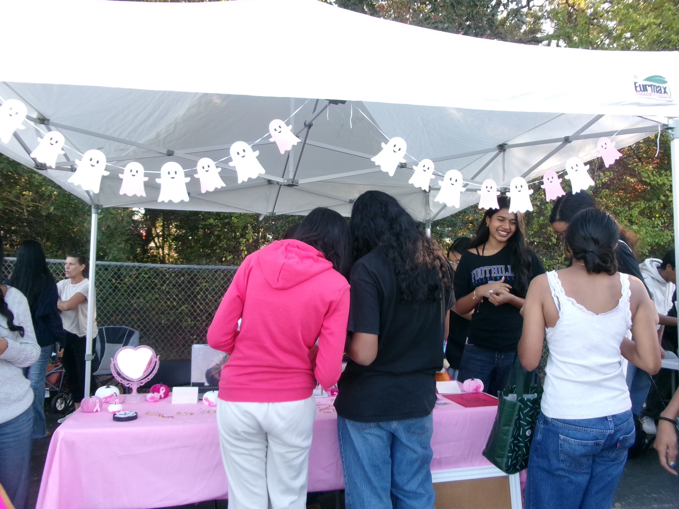 Rare Gems market booth with visitors